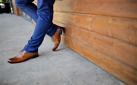 blue chinos brown shoes|blue slacks with brown shoes.